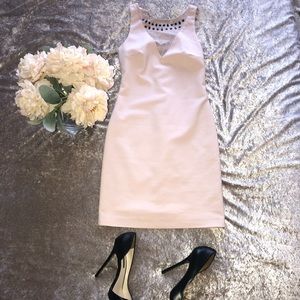 Blush colored minidress with jeweled neckline